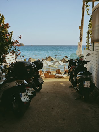 A group of motorcycles parked next to each other