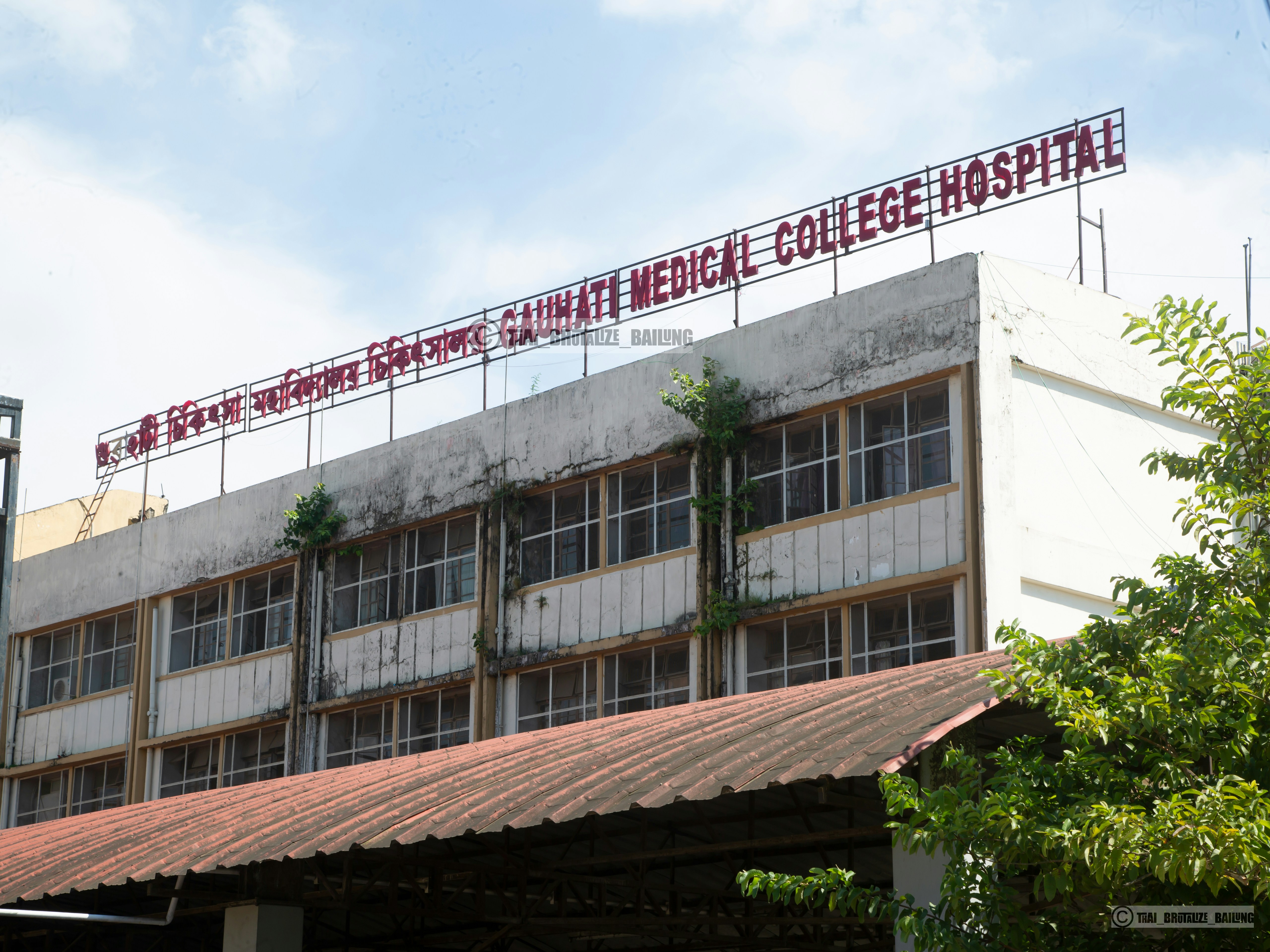 Manipal Hospitals healthcare logo on modern medical facility