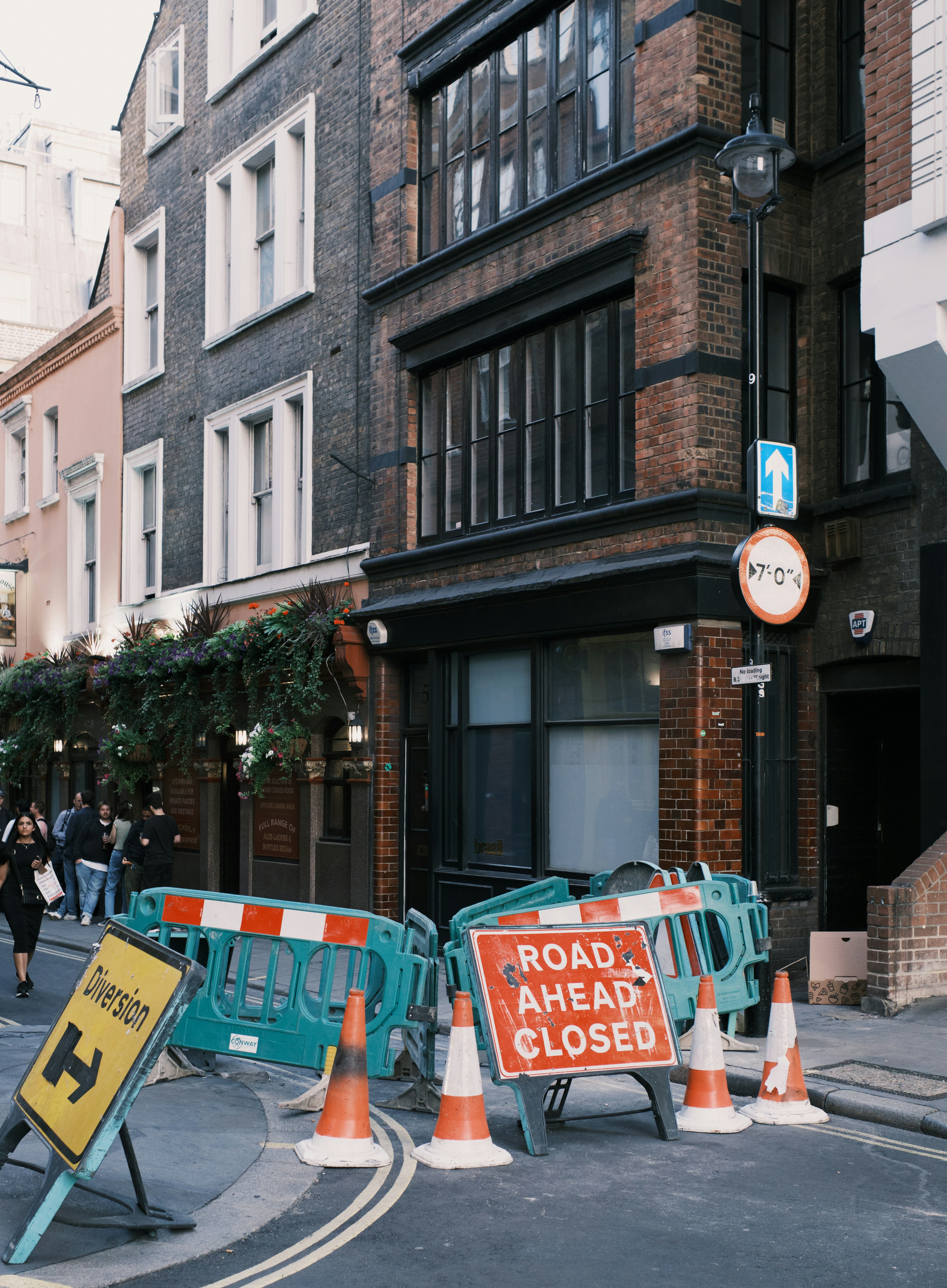 A road closed sign on a city street