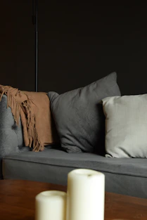 A living room with a couch and a table