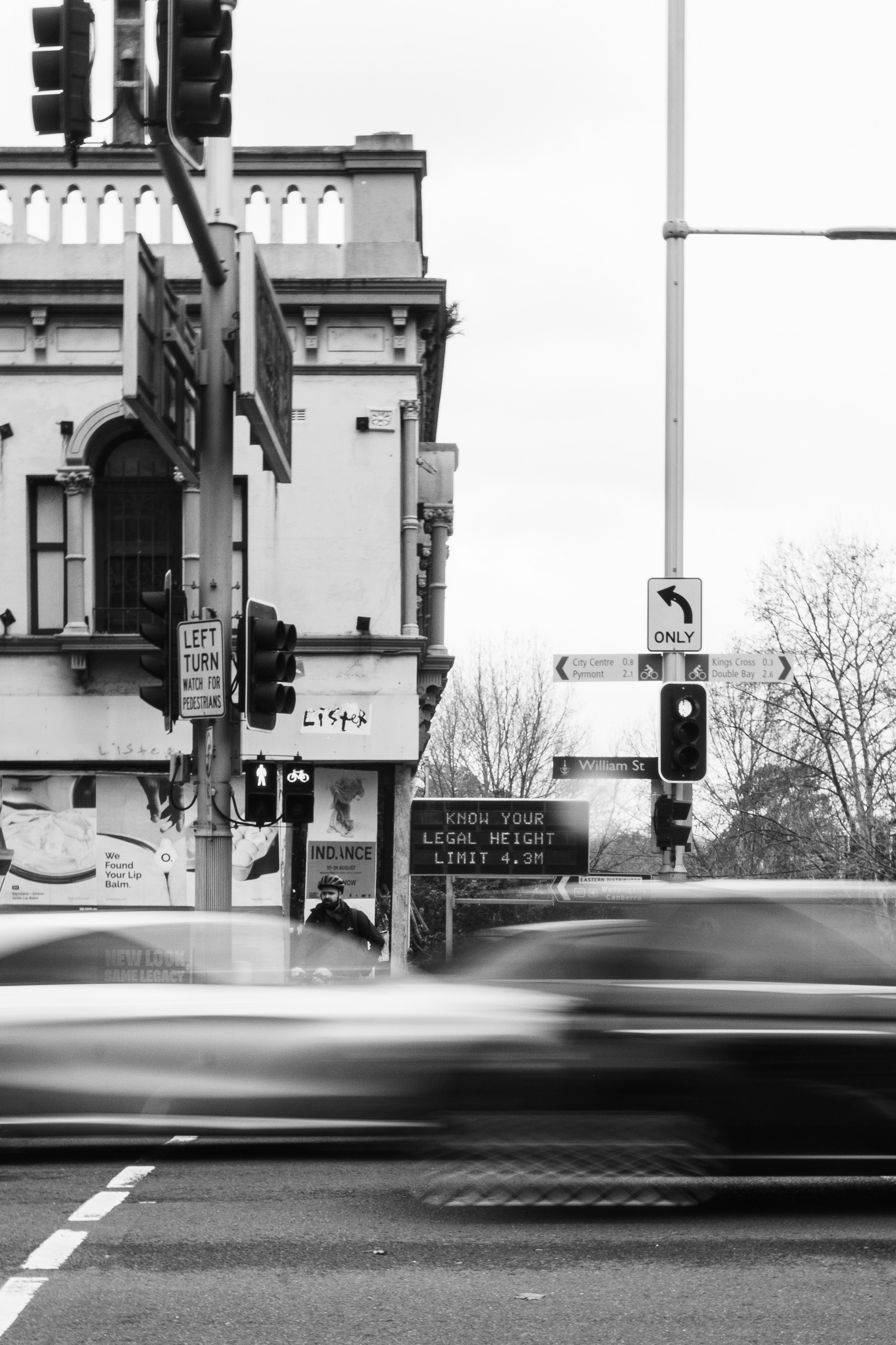 A black and white photo of a city street