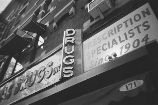 A black and white photo of a store front