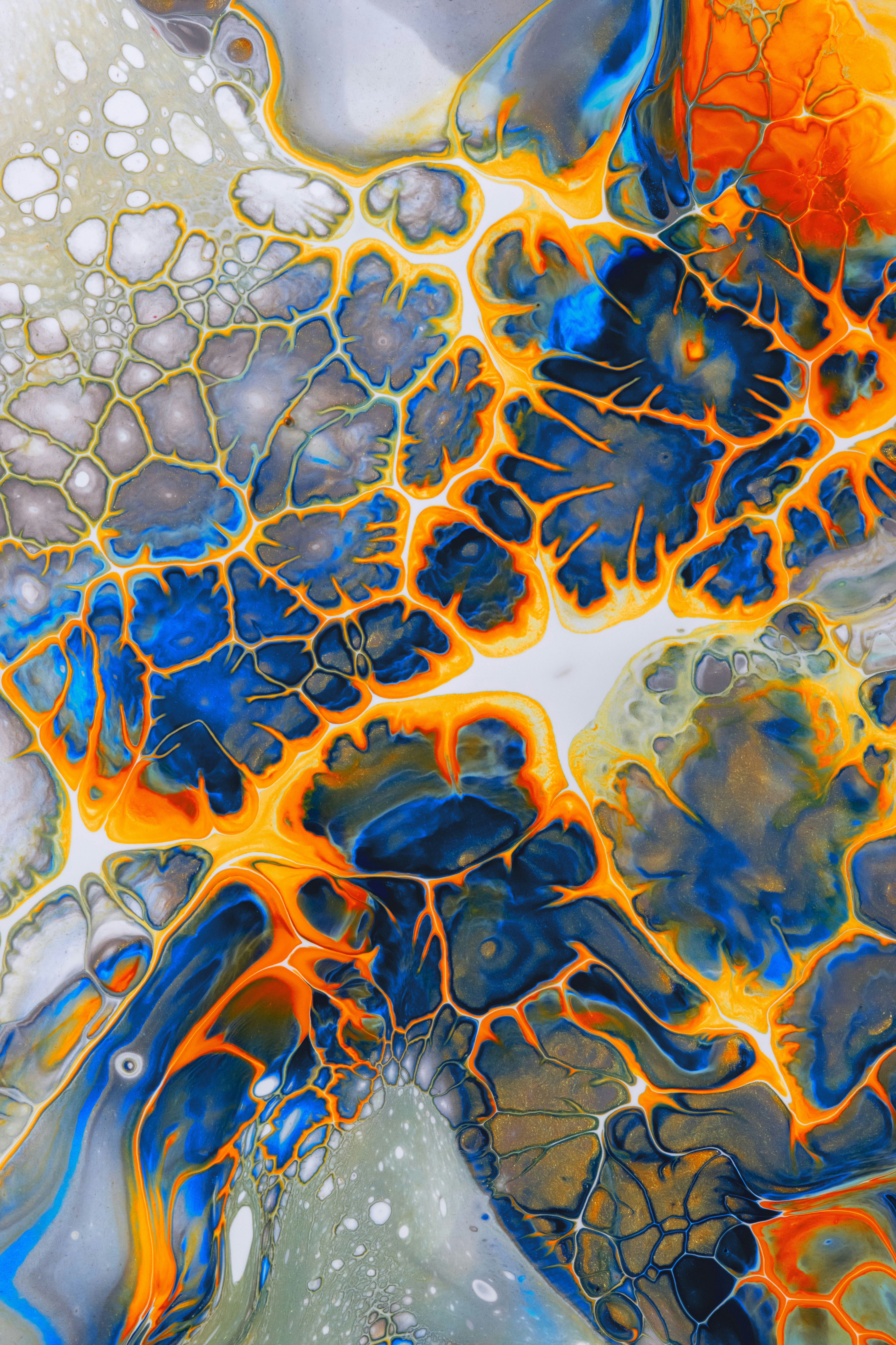 An abstract painting with blue, orange and yellow colors