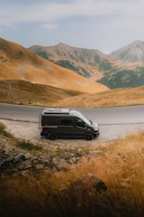 A van is parked on the side of the road