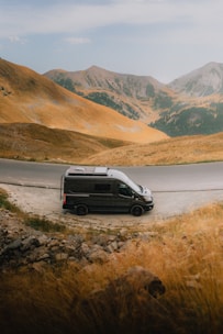 A van is parked on the side of the road