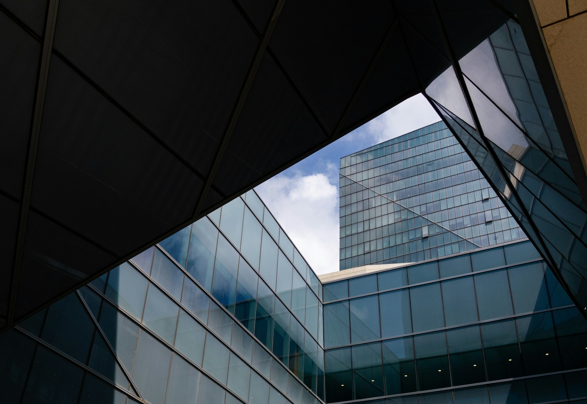 A view of a very tall building through a window