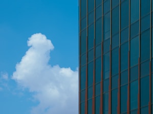 A tall building with a sky in the background