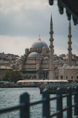 A view of a large building from across a body of water