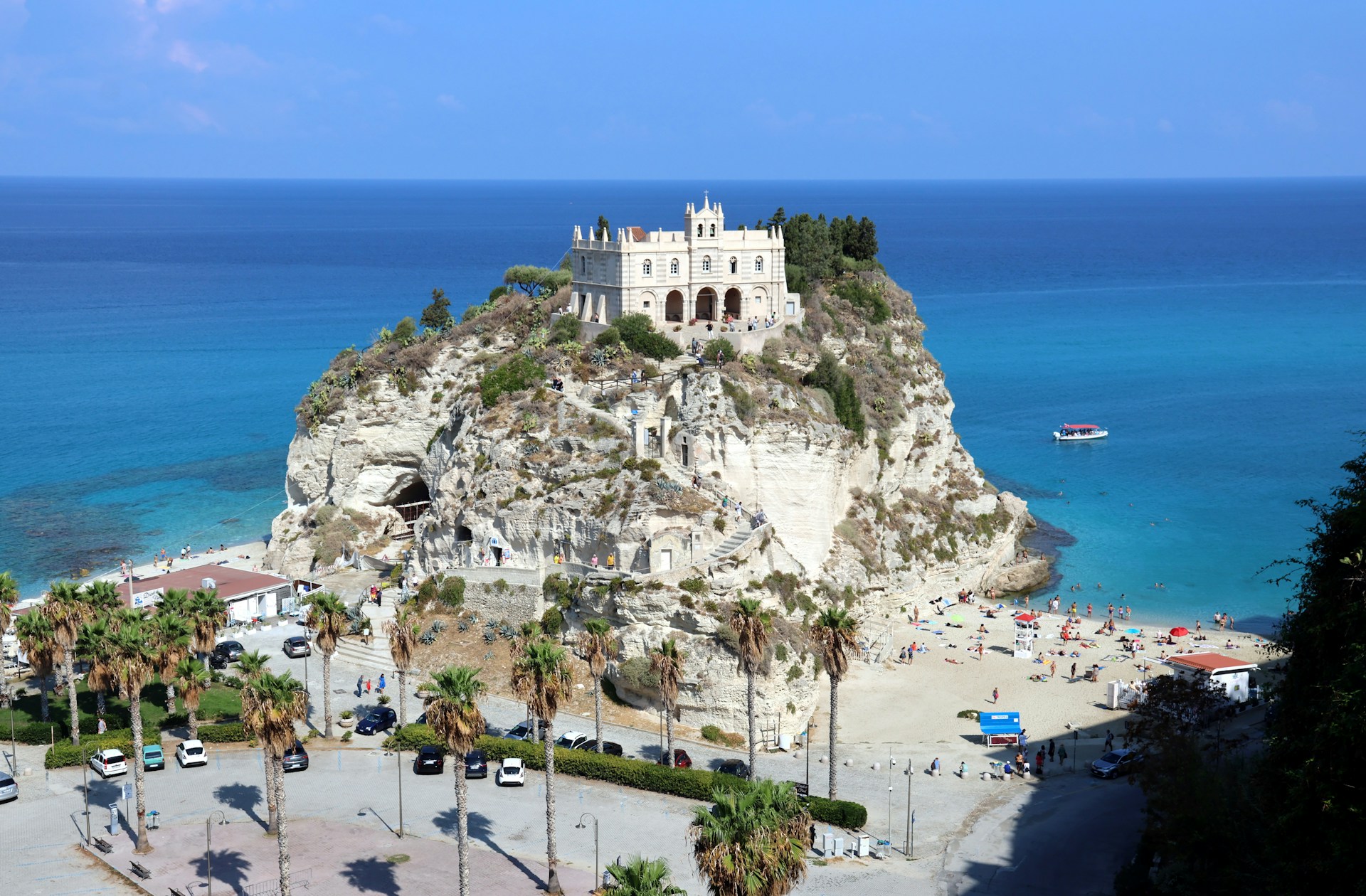 A view of a beach with a castle on top of it