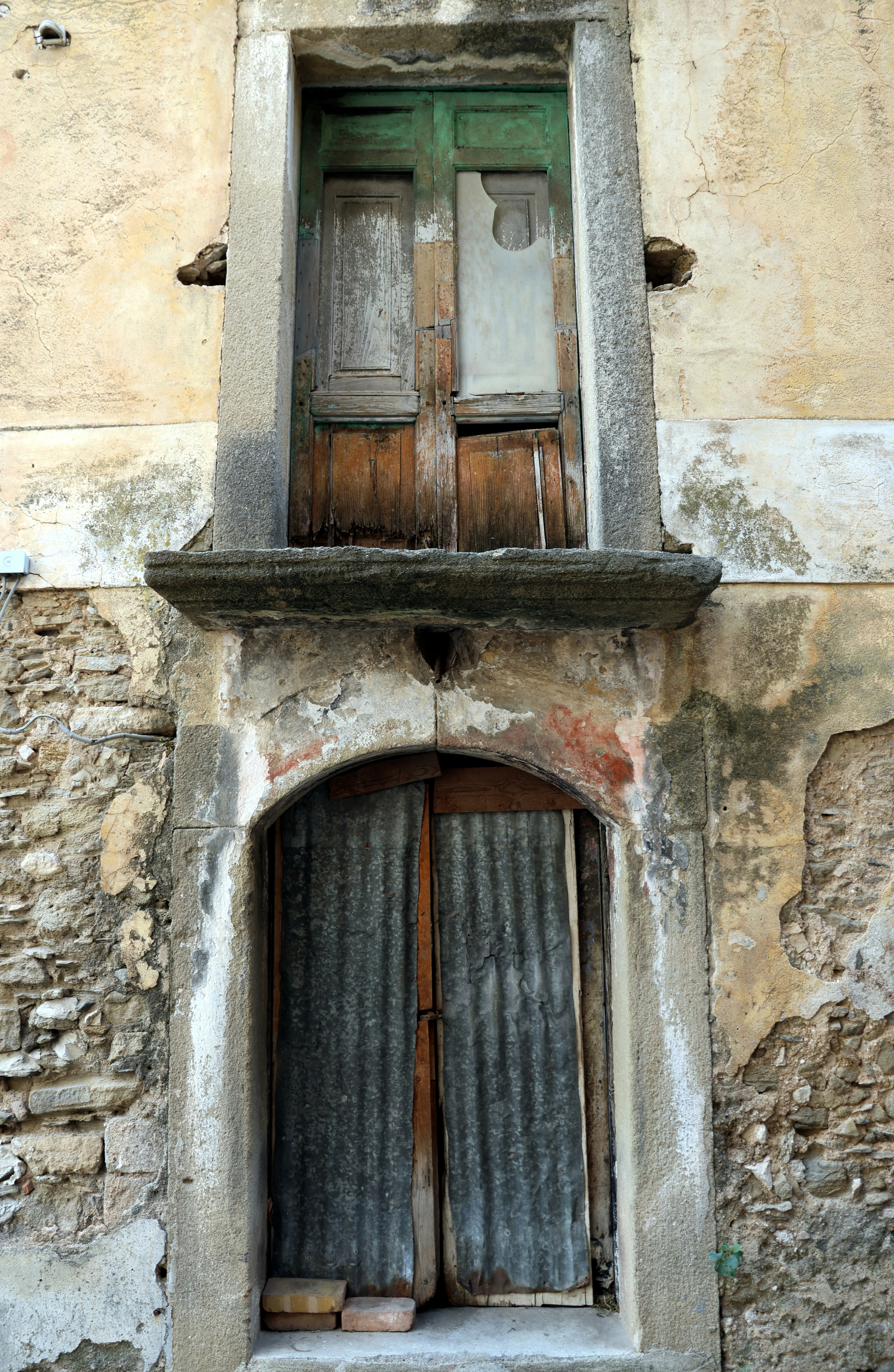 An old building with a door and window