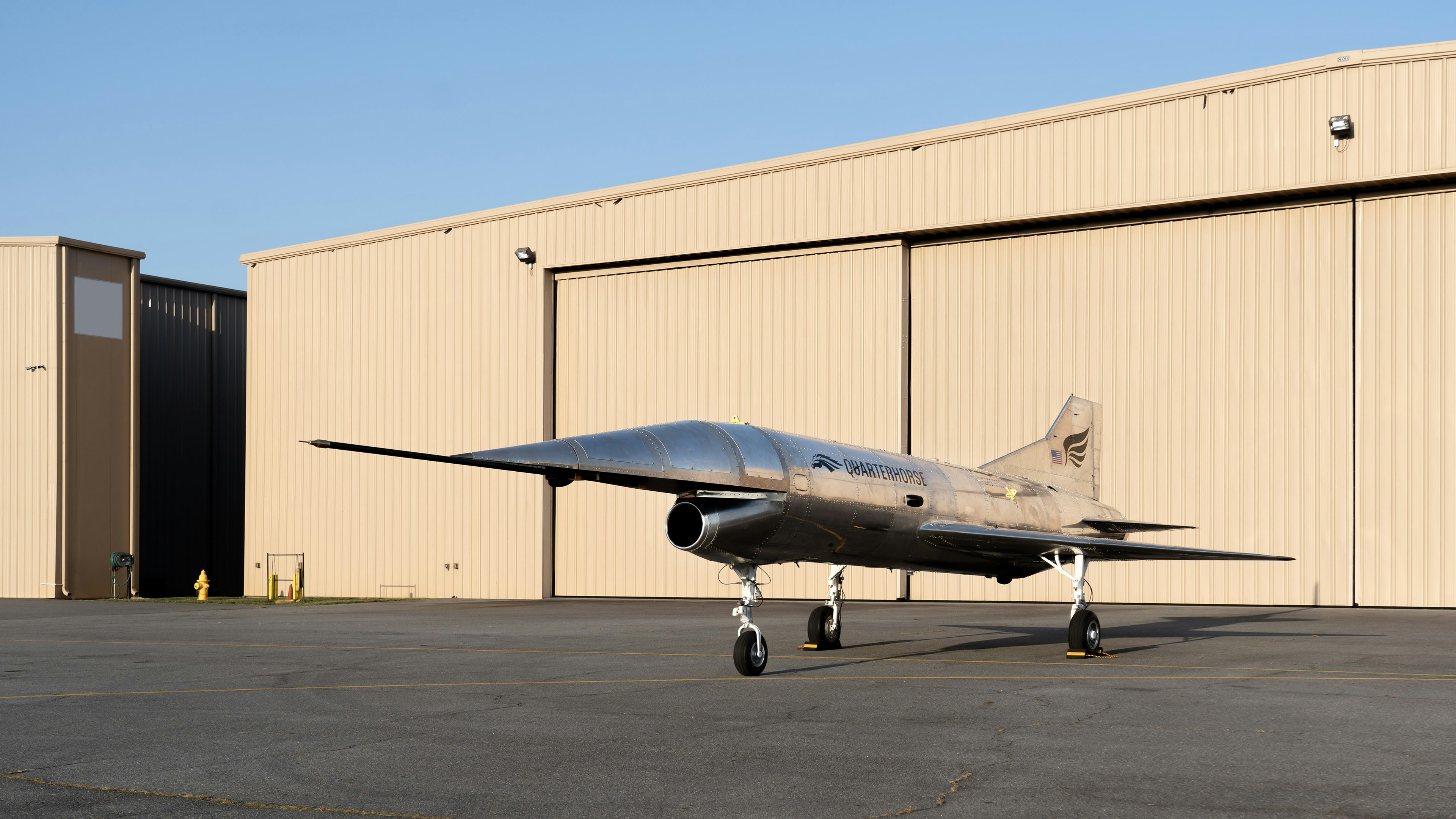 A jet sitting on top of an airport tarmac