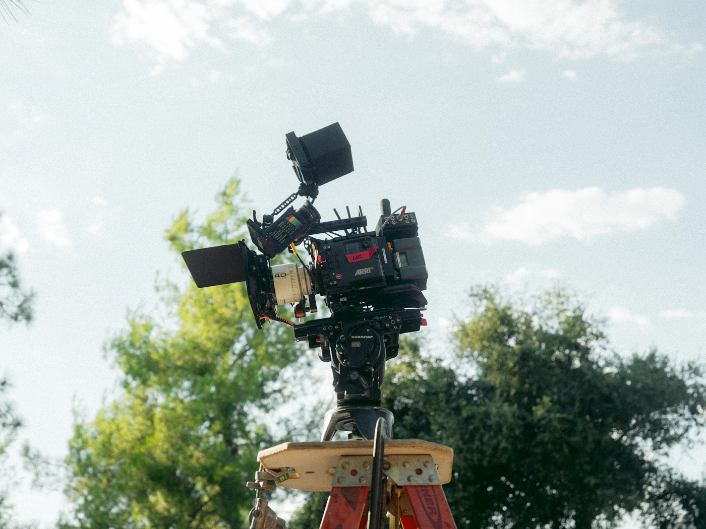 Professional cinema camera on a bright outdoor film set