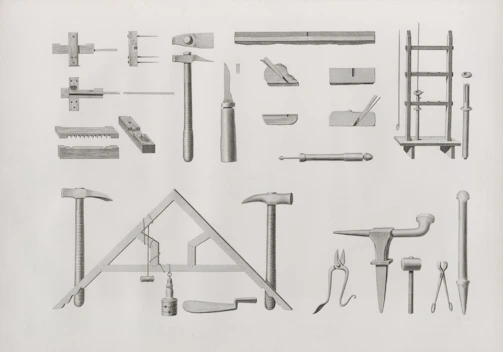 Collection of antique woodworking and metalworking tools.