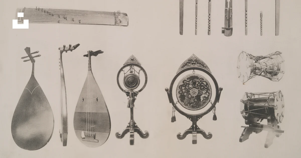 Popular Asian Instruments Various traditional asian musical instruments displayed on a white ...