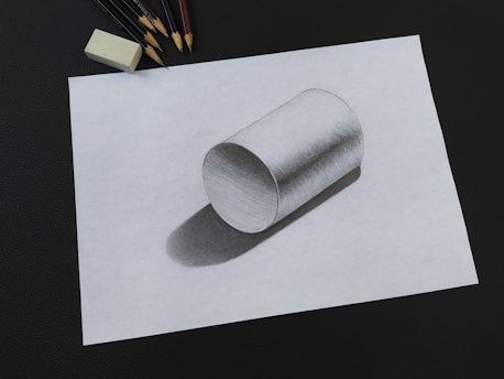 A pencil drawing of a tube and pencils
