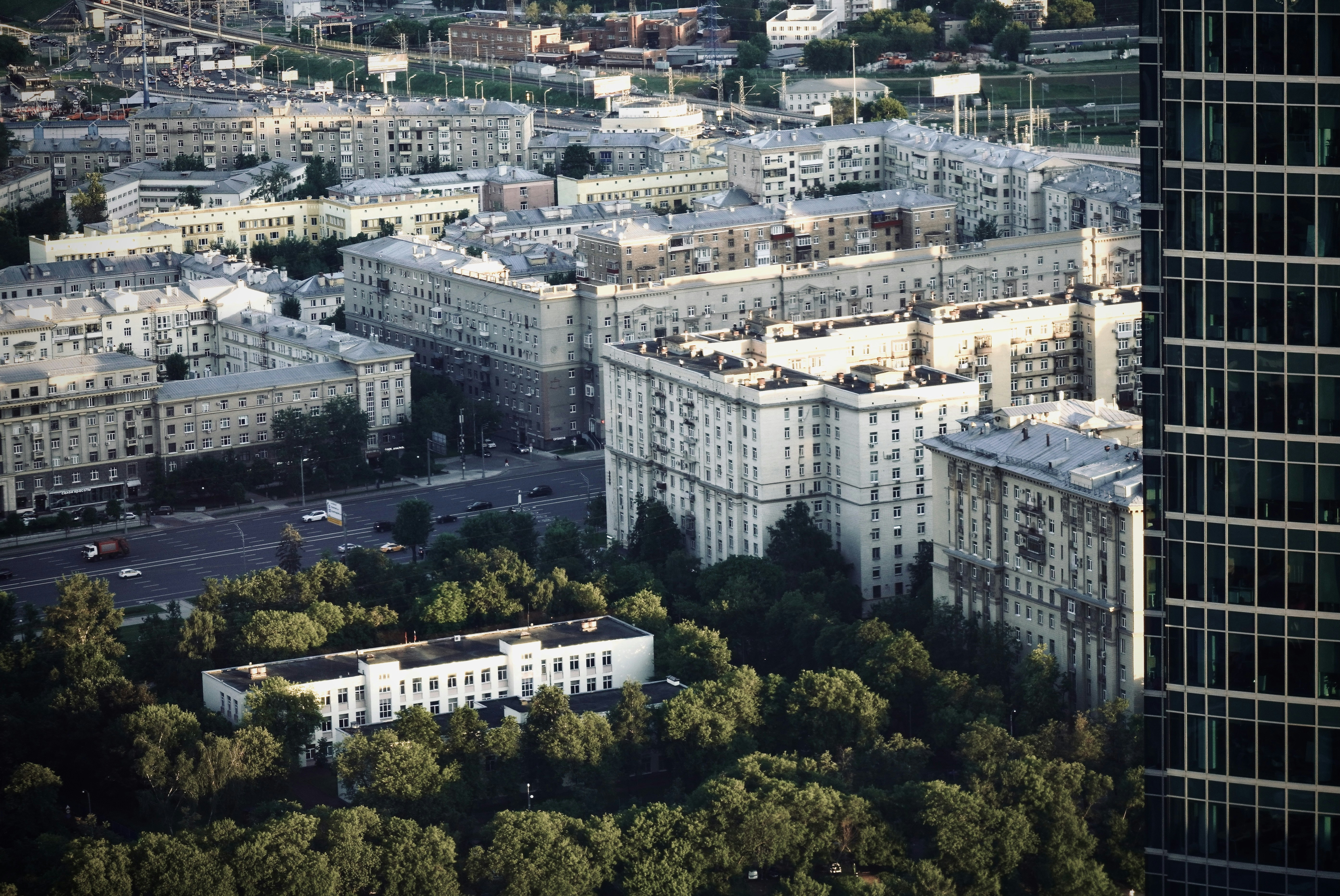 An aerial view of a city with tall buildings