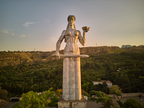 The aluminum Mother of Georgia statue holding a sword and a bowl of wine.