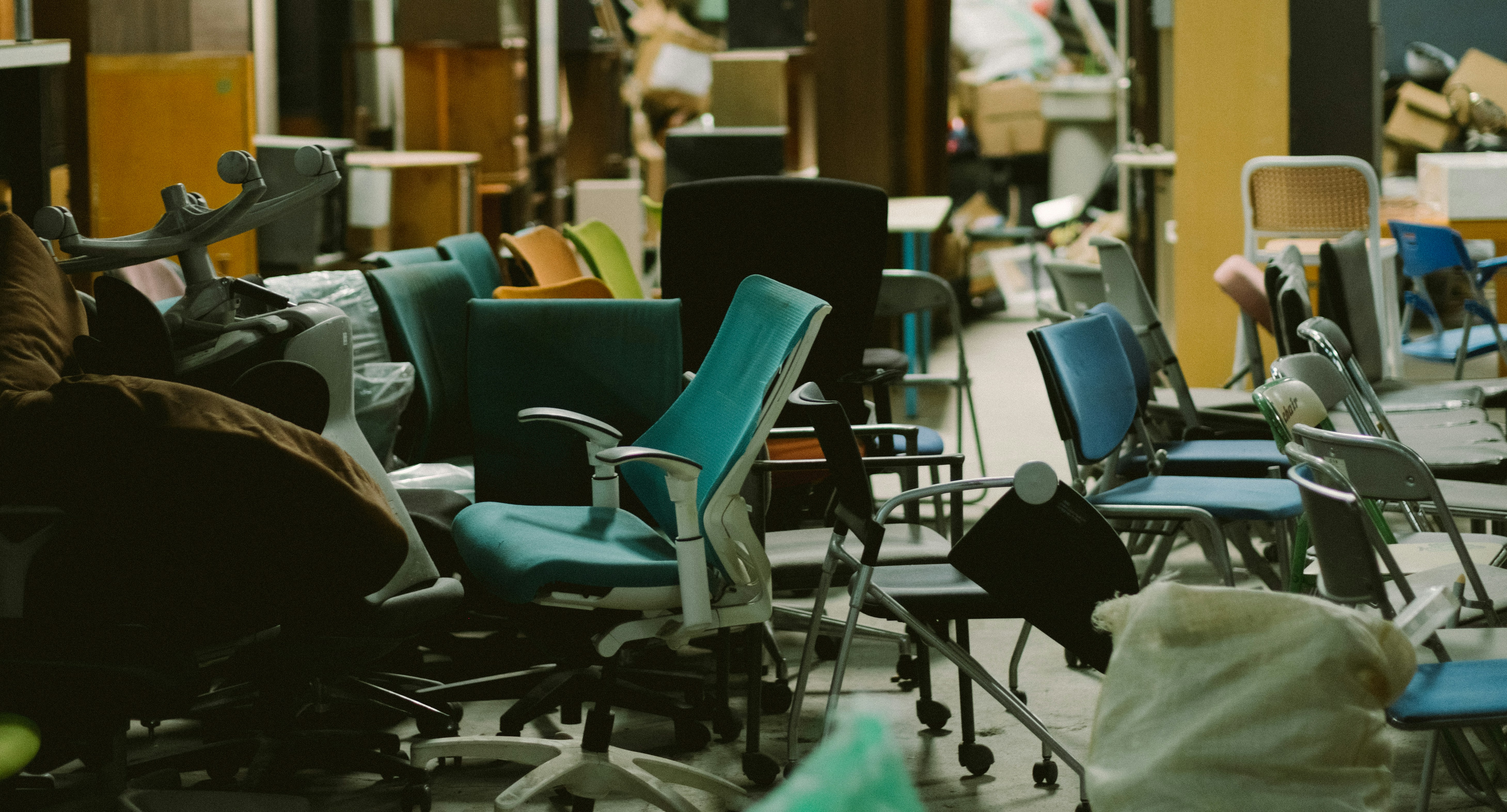 A room filled with lots of chairs and tables
