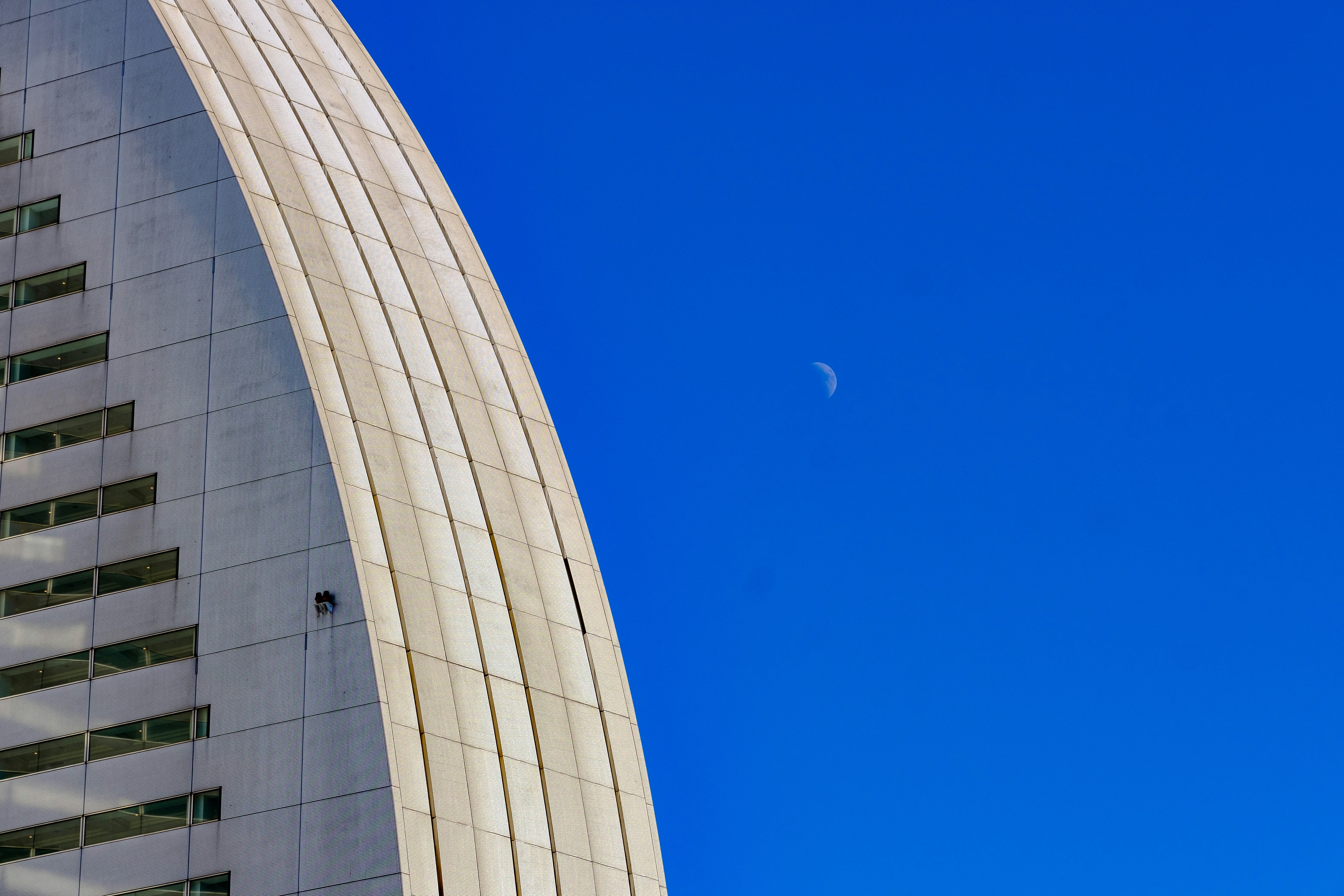 A tall building with a clock on the side of it