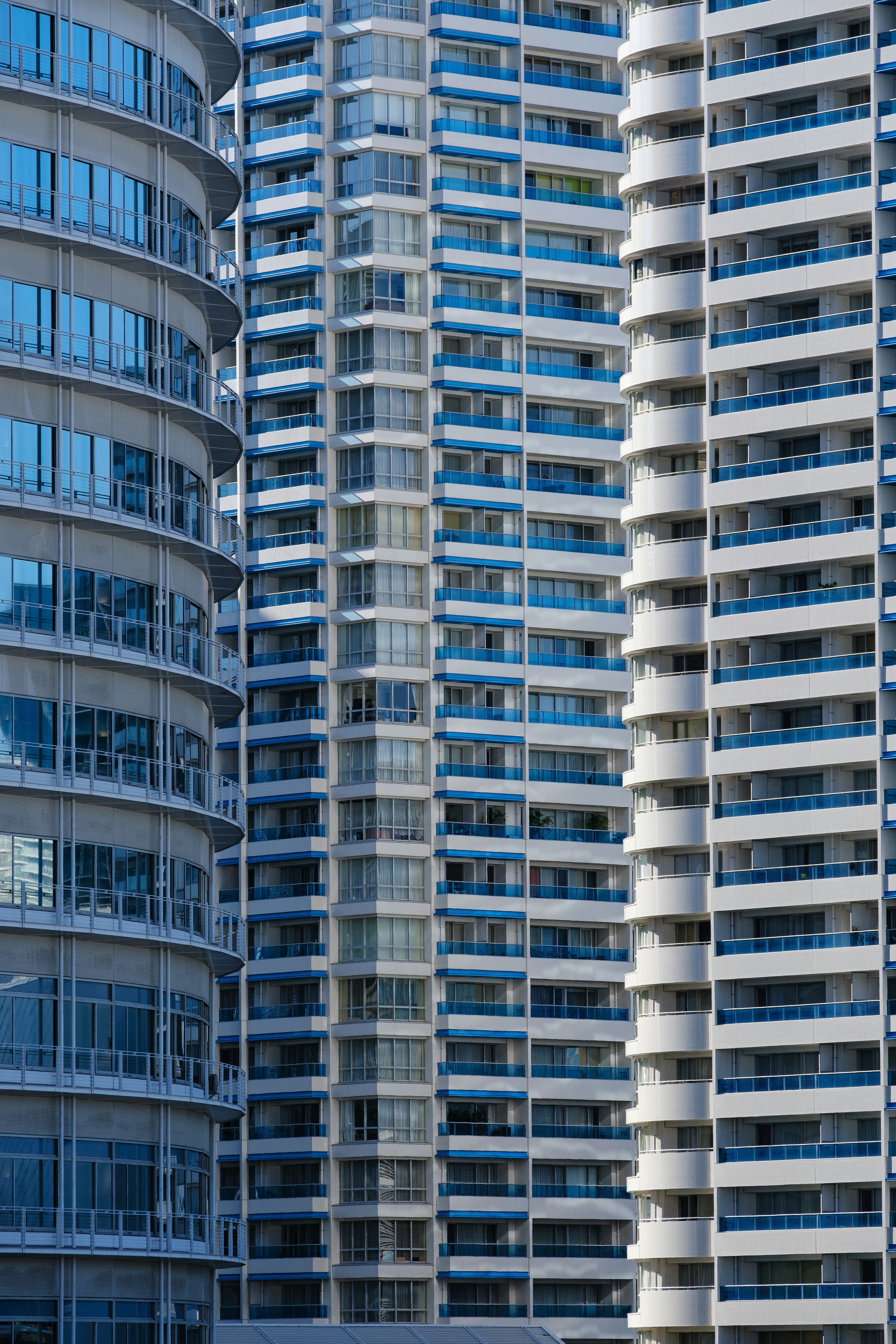 A couple of tall buildings next to each other