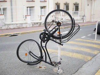 A bicycle parked on the side of the road