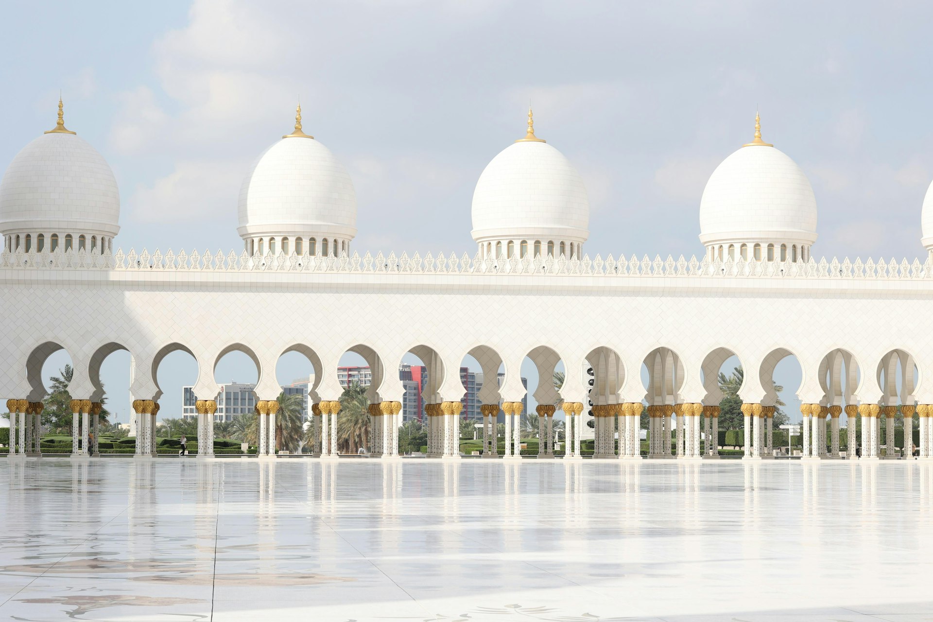 A large white building with a lot of arches