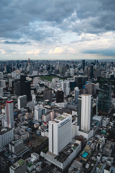An aerial view of a city with tall buildings