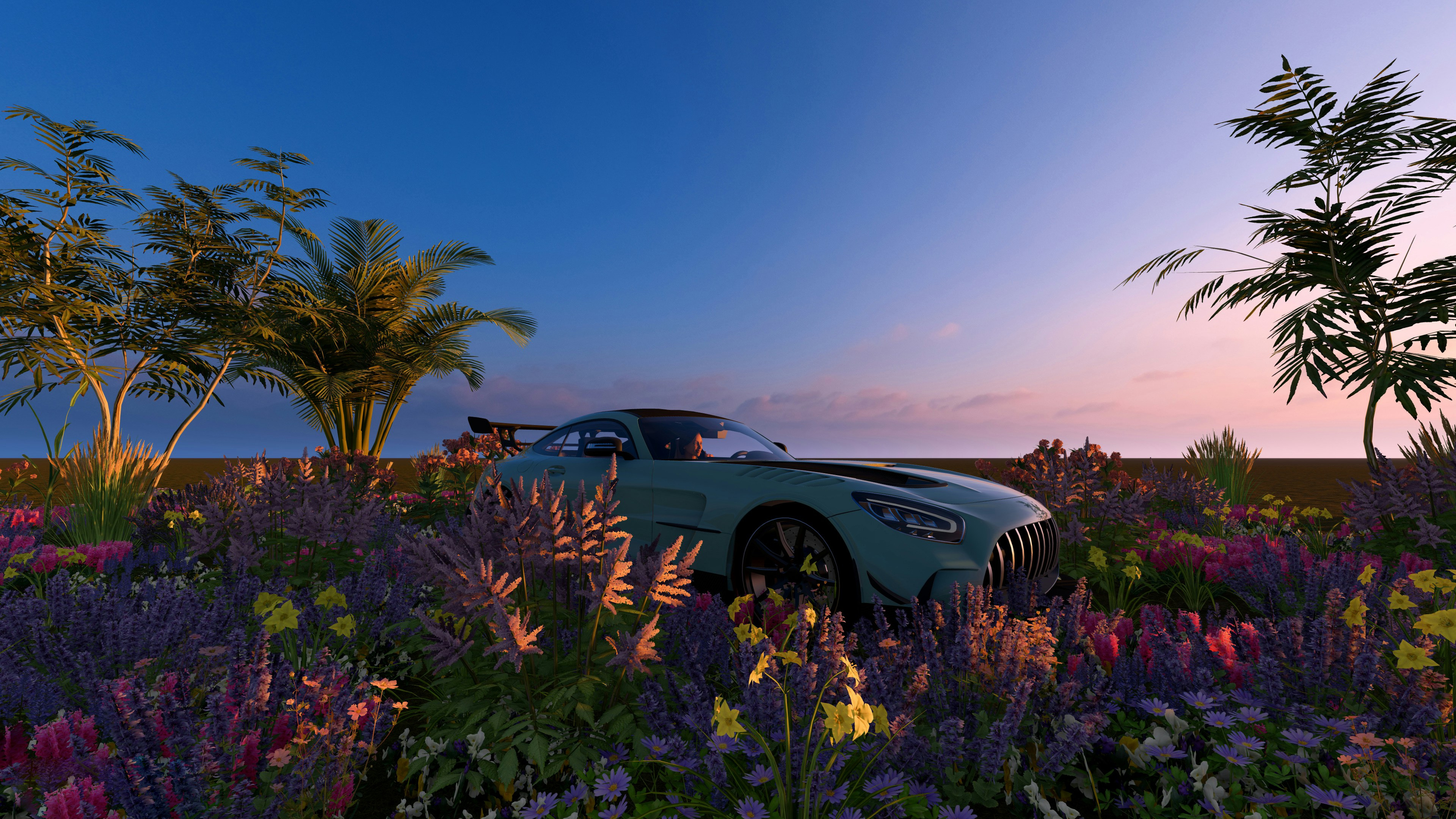 A car is parked in a field of flowers