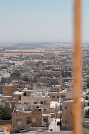 A view of a city from the top of a building