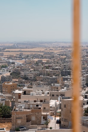 A view of a city from the top of a building
