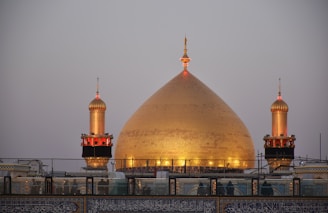 A large building with a golden dome on top of it