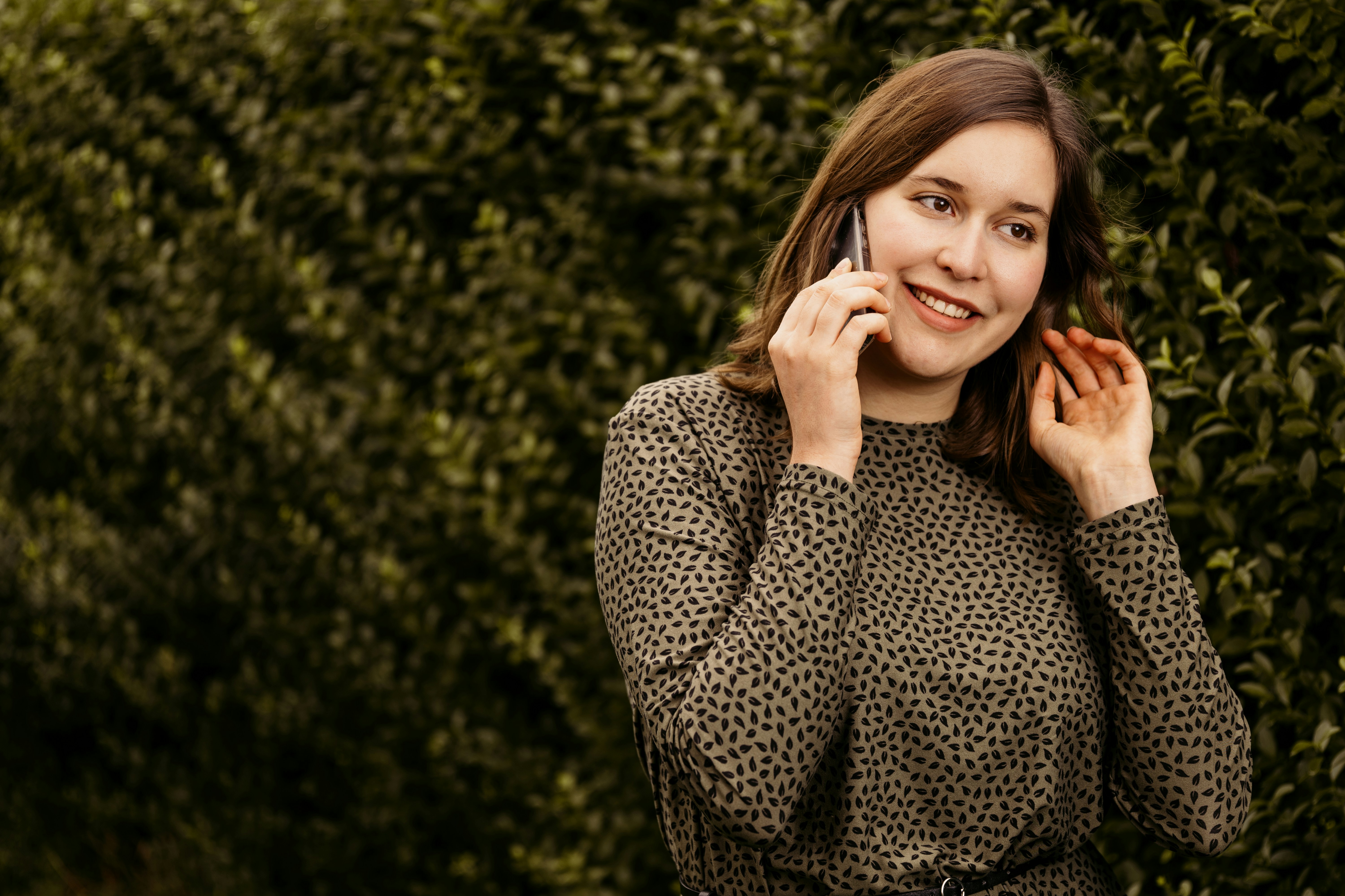 A young woman talking on a cell phone