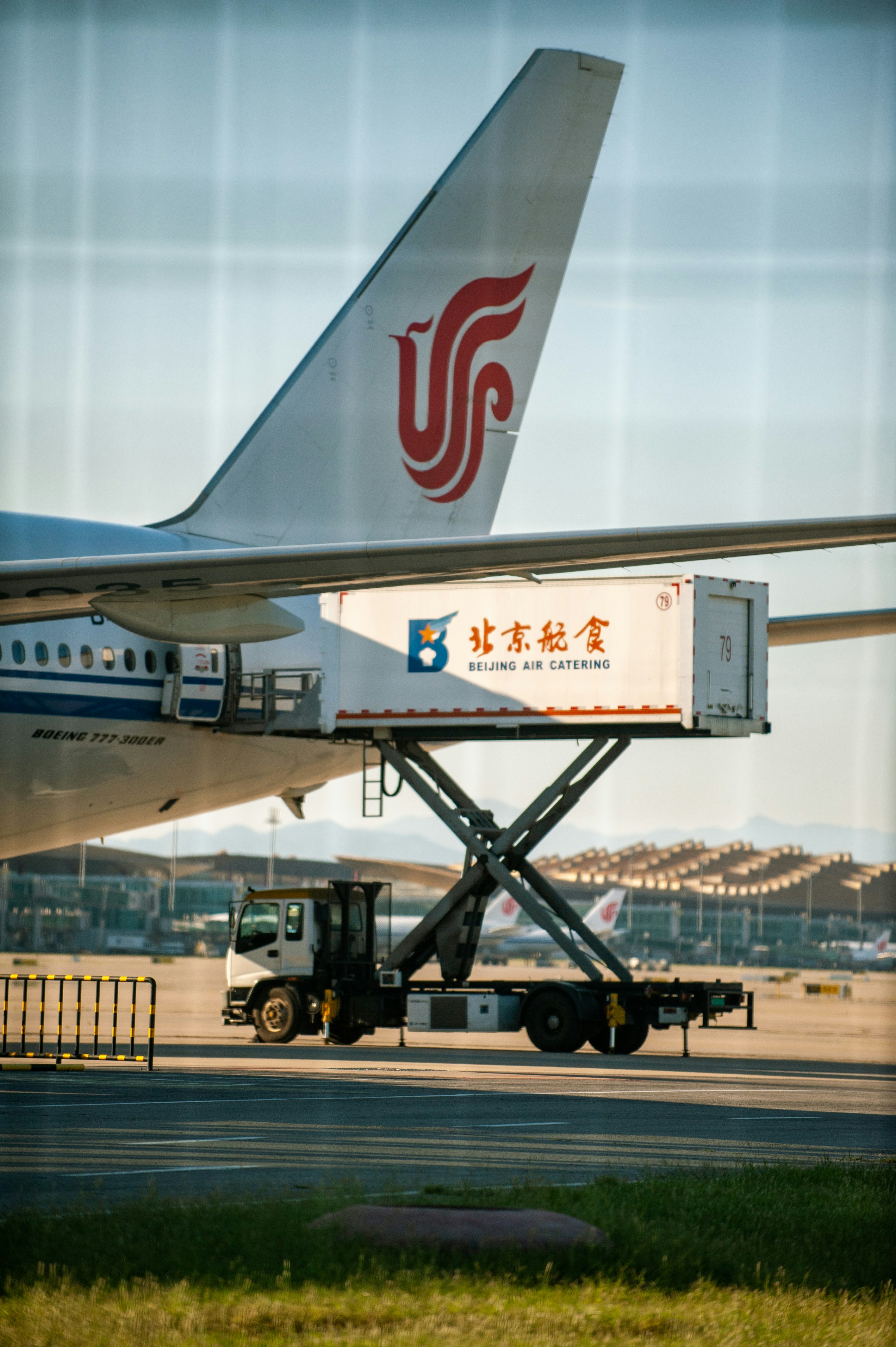 A large jetliner sitting on top of an airport tarmac
