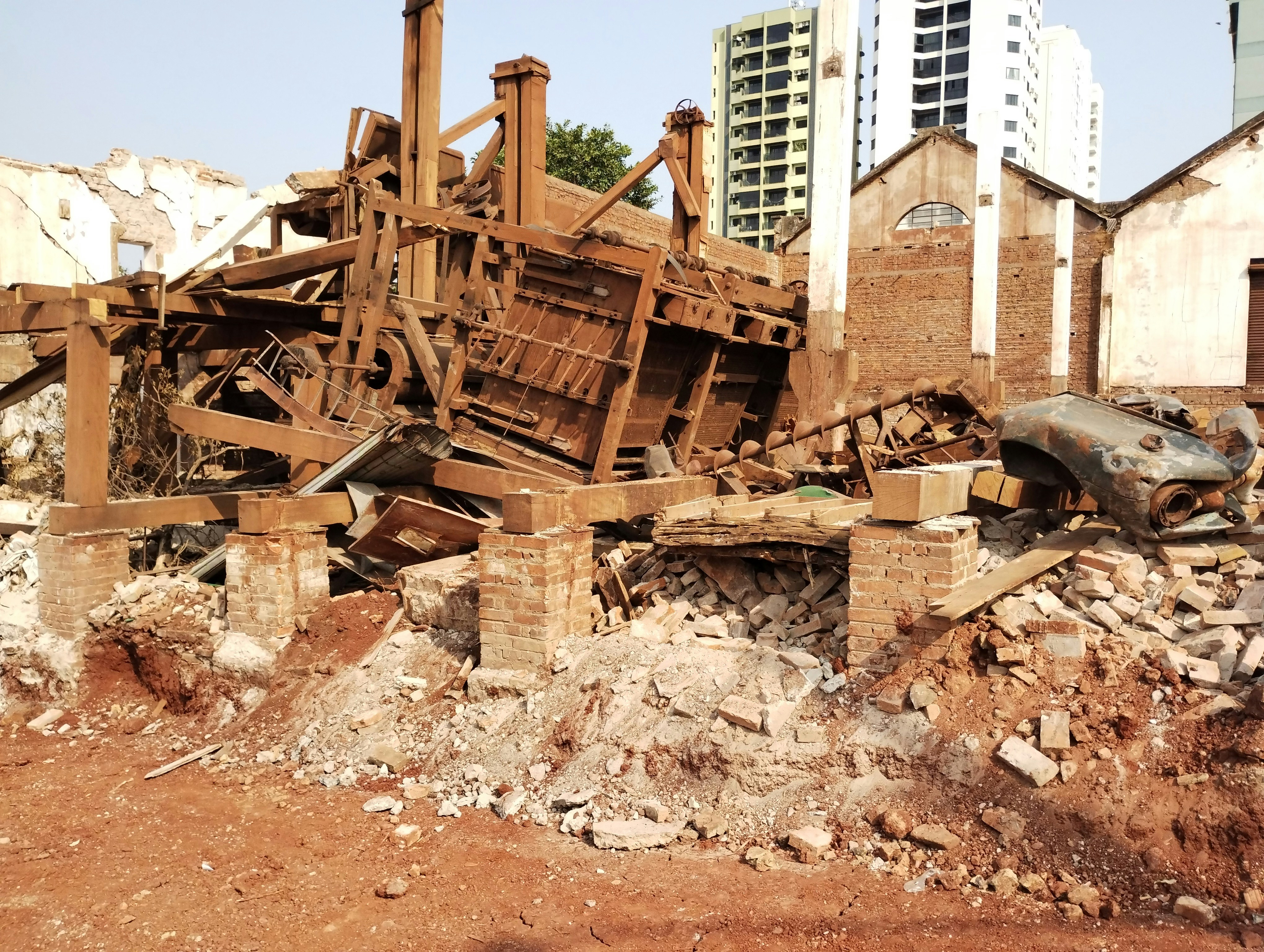 A pile of rubble sitting in front of a building