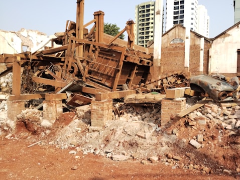 A pile of rubble sitting in front of a building