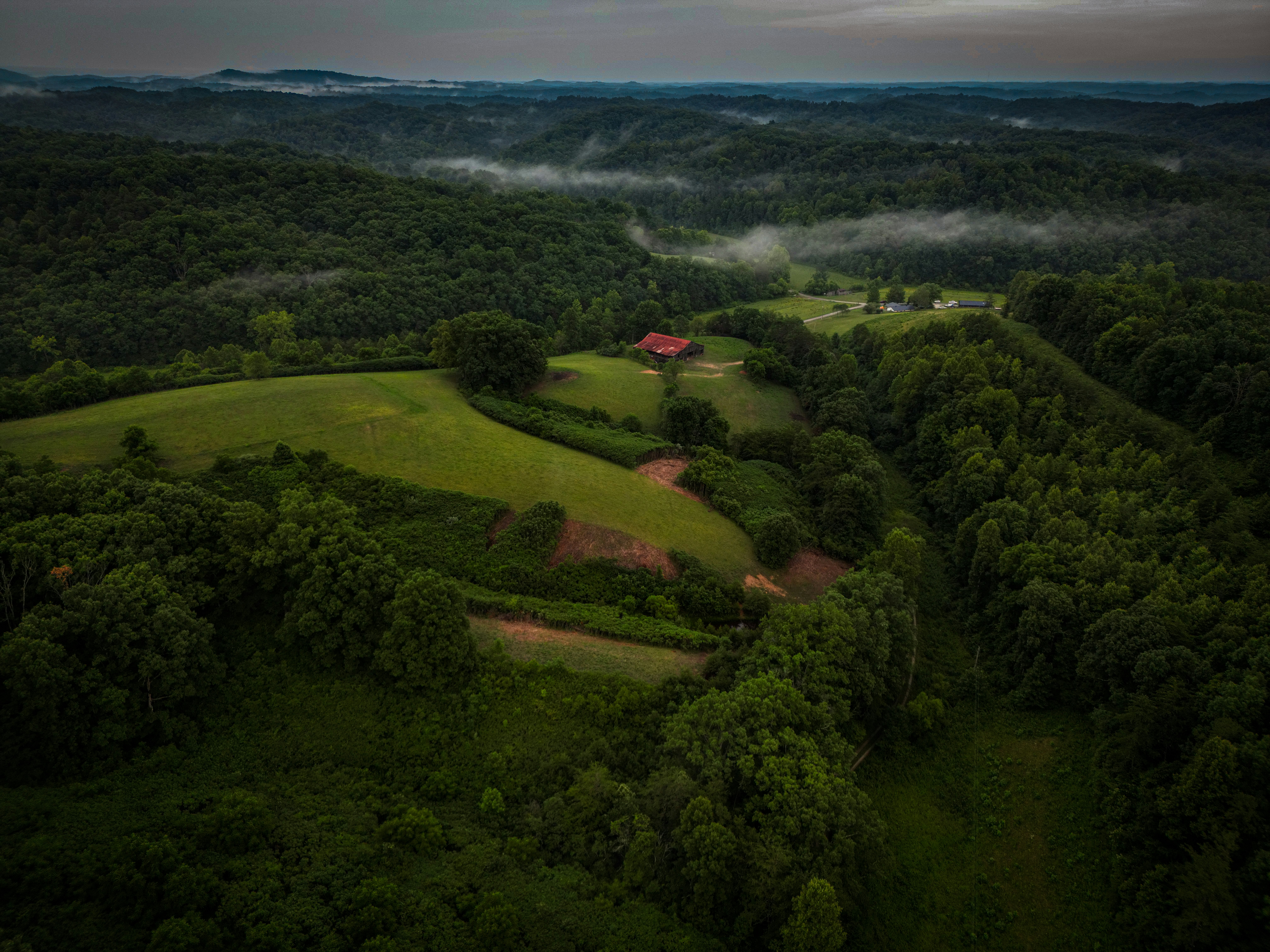 An aerial view of a lush green valley