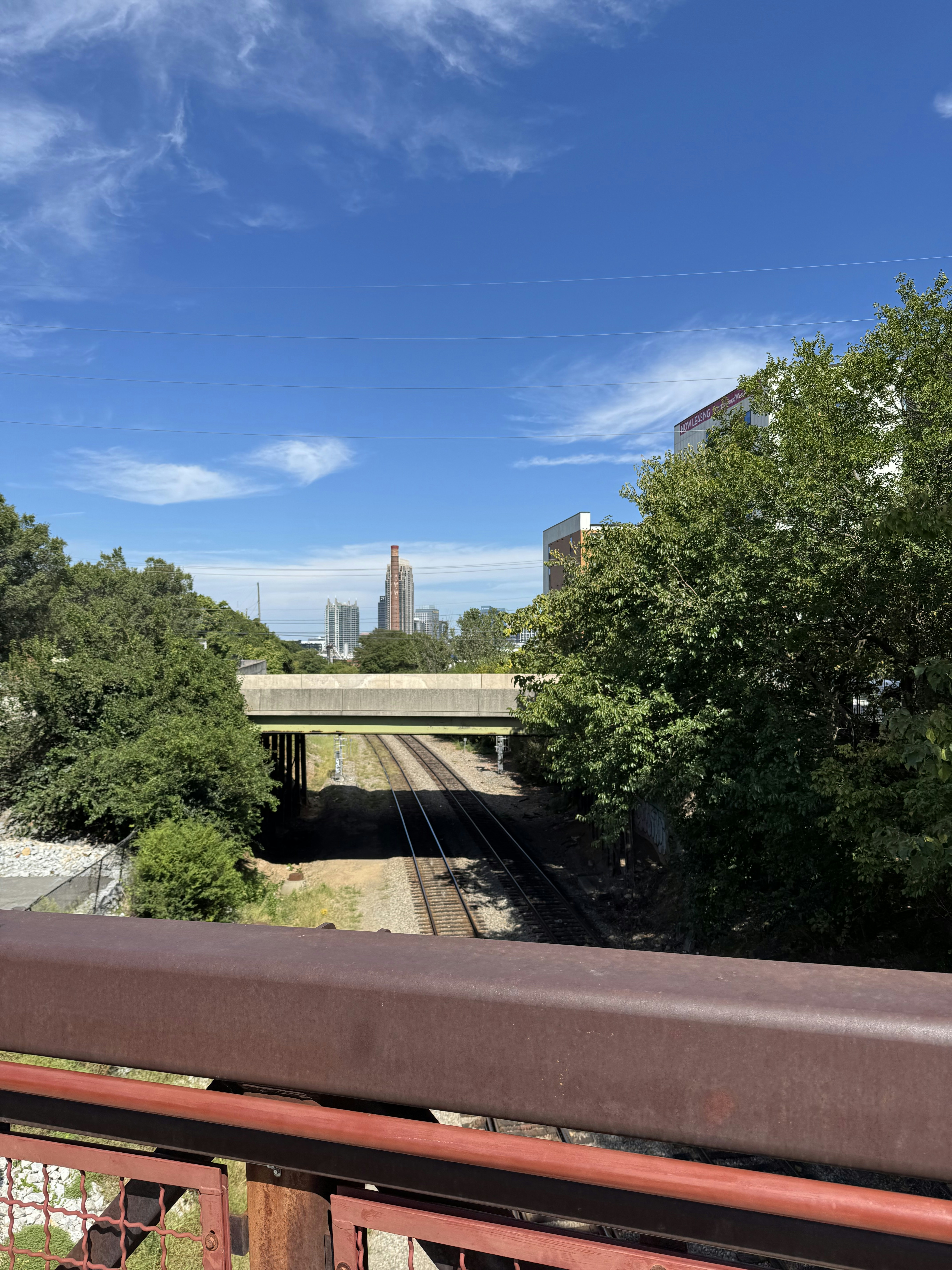 A train traveling over a bridge over a river