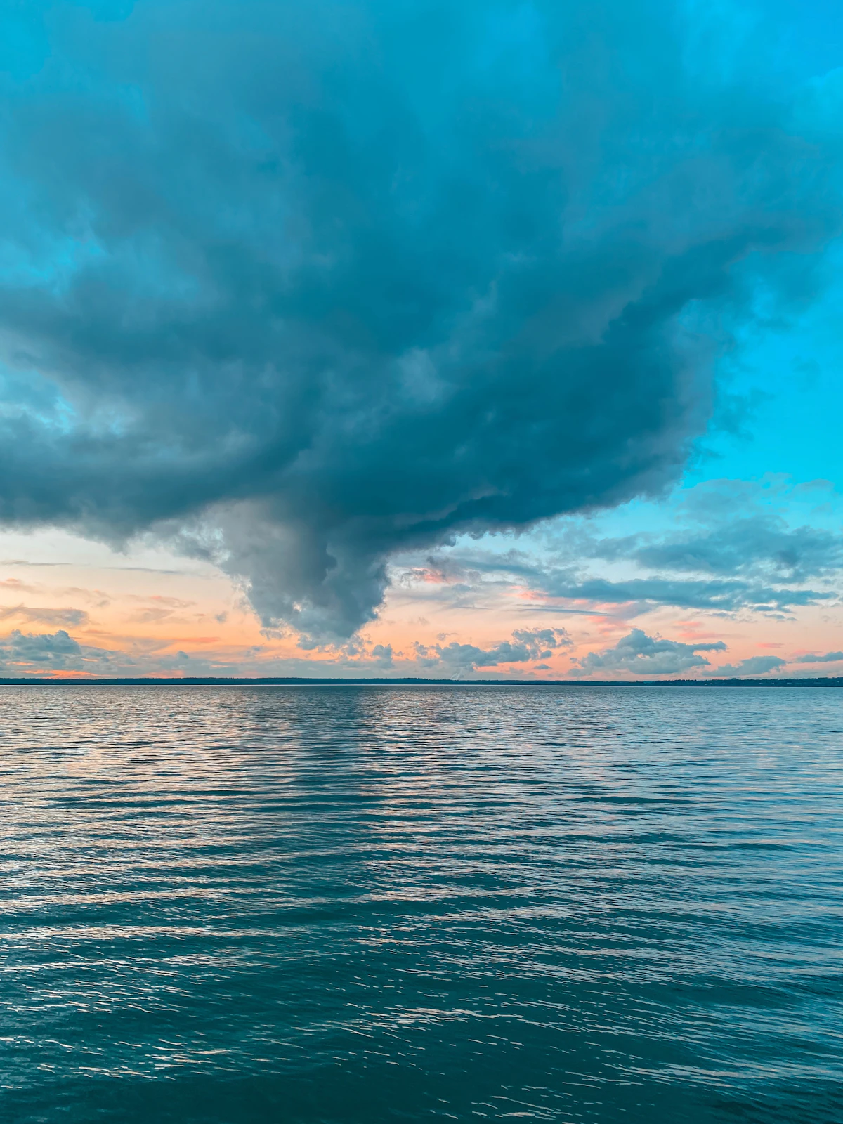 A dark rain cloud over Bellingham Bay, seen from Chuckanut Drive