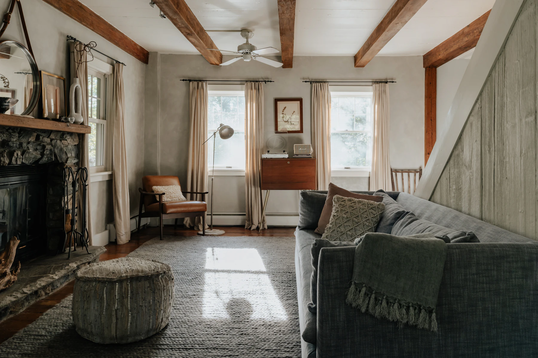 Characterful living room with fireplace and existing architectural features