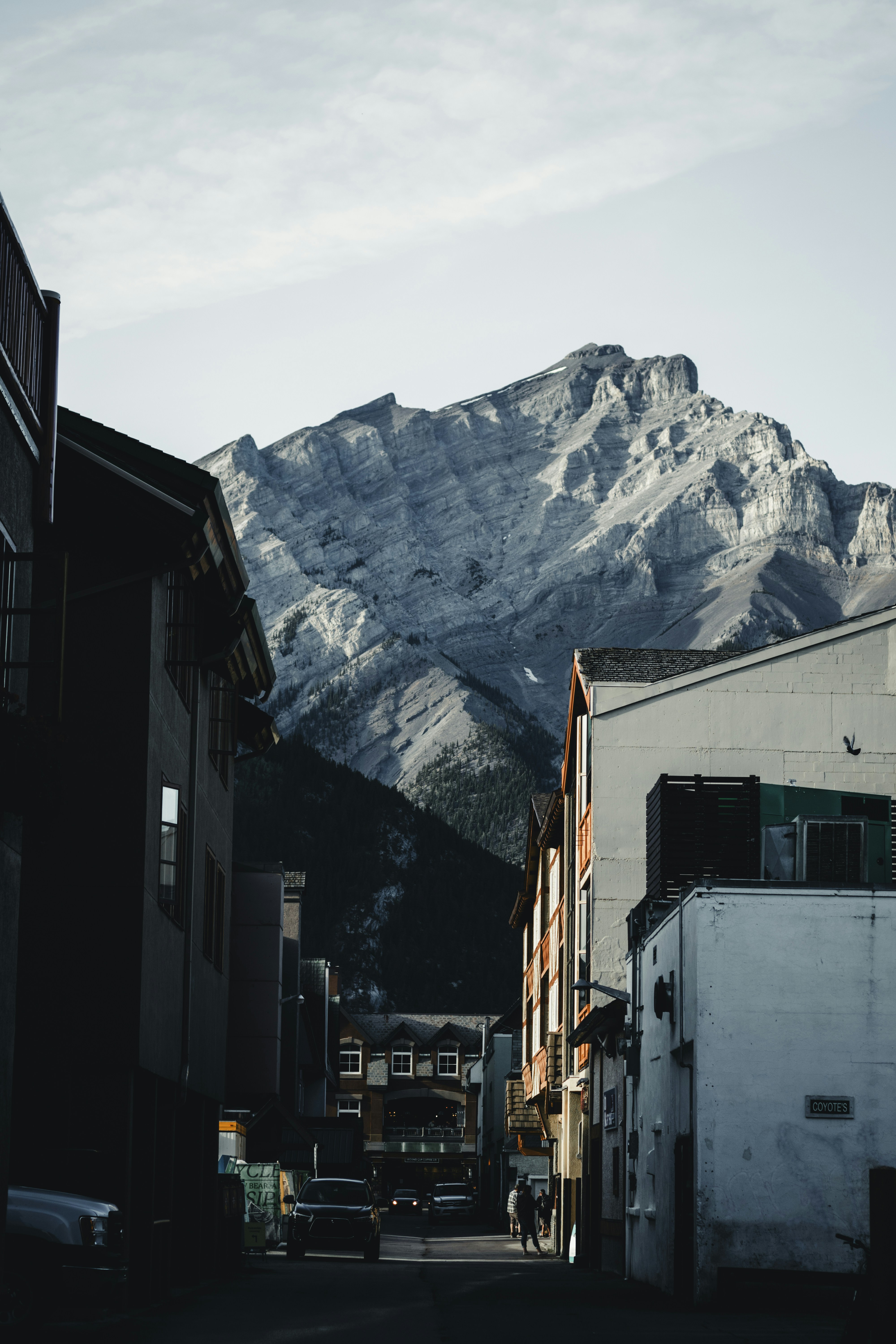 City street with mountains rising in the background