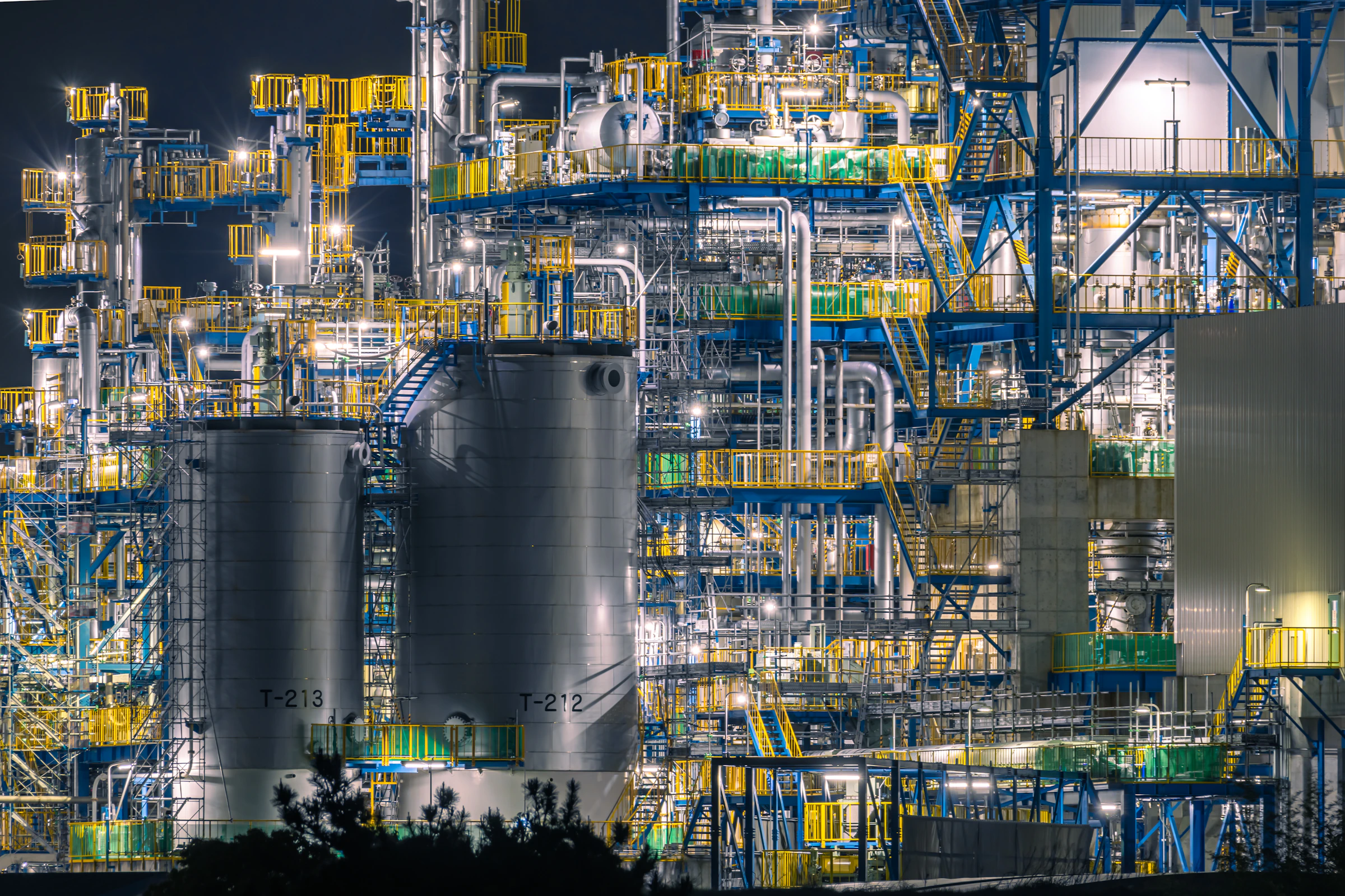 Oil refinery illuminated at night