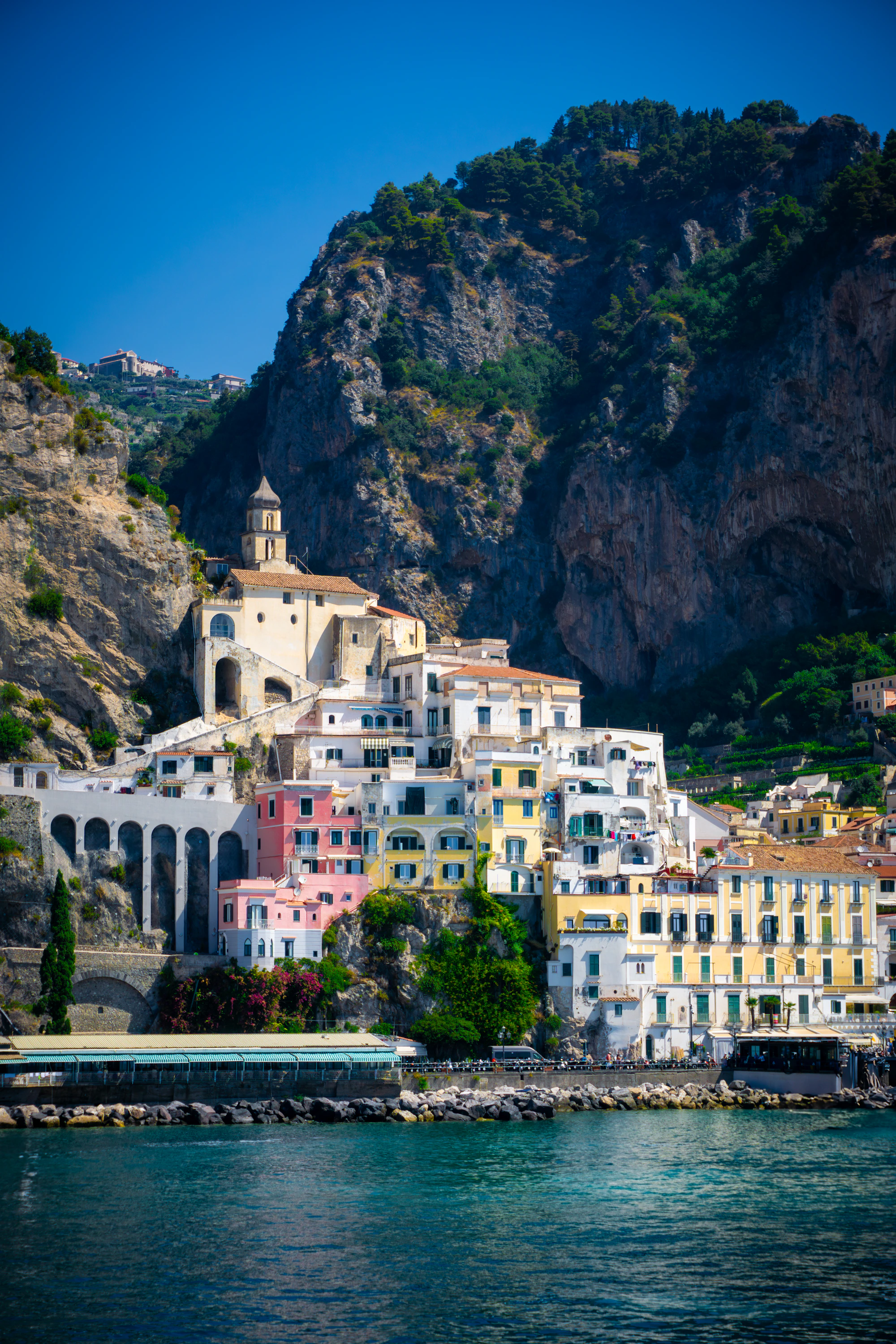 Colorful cliffside village overlooking the turquoise Amalfi Coast