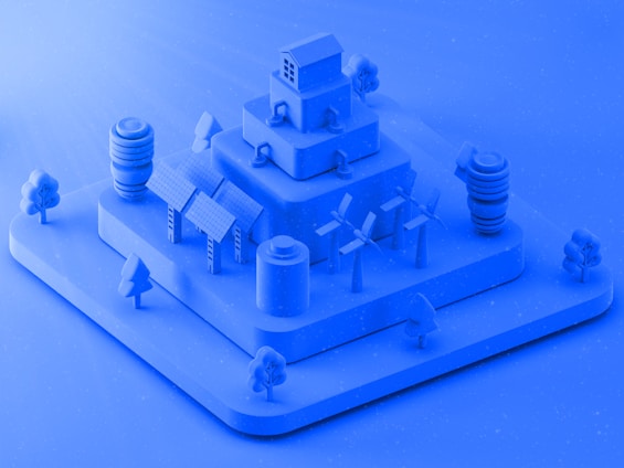 A blue model of a building with a clock on top of it