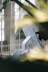 A person using a laptop computer on a table