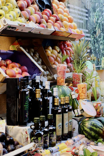 A fruit stand with a variety of fruits and condiments