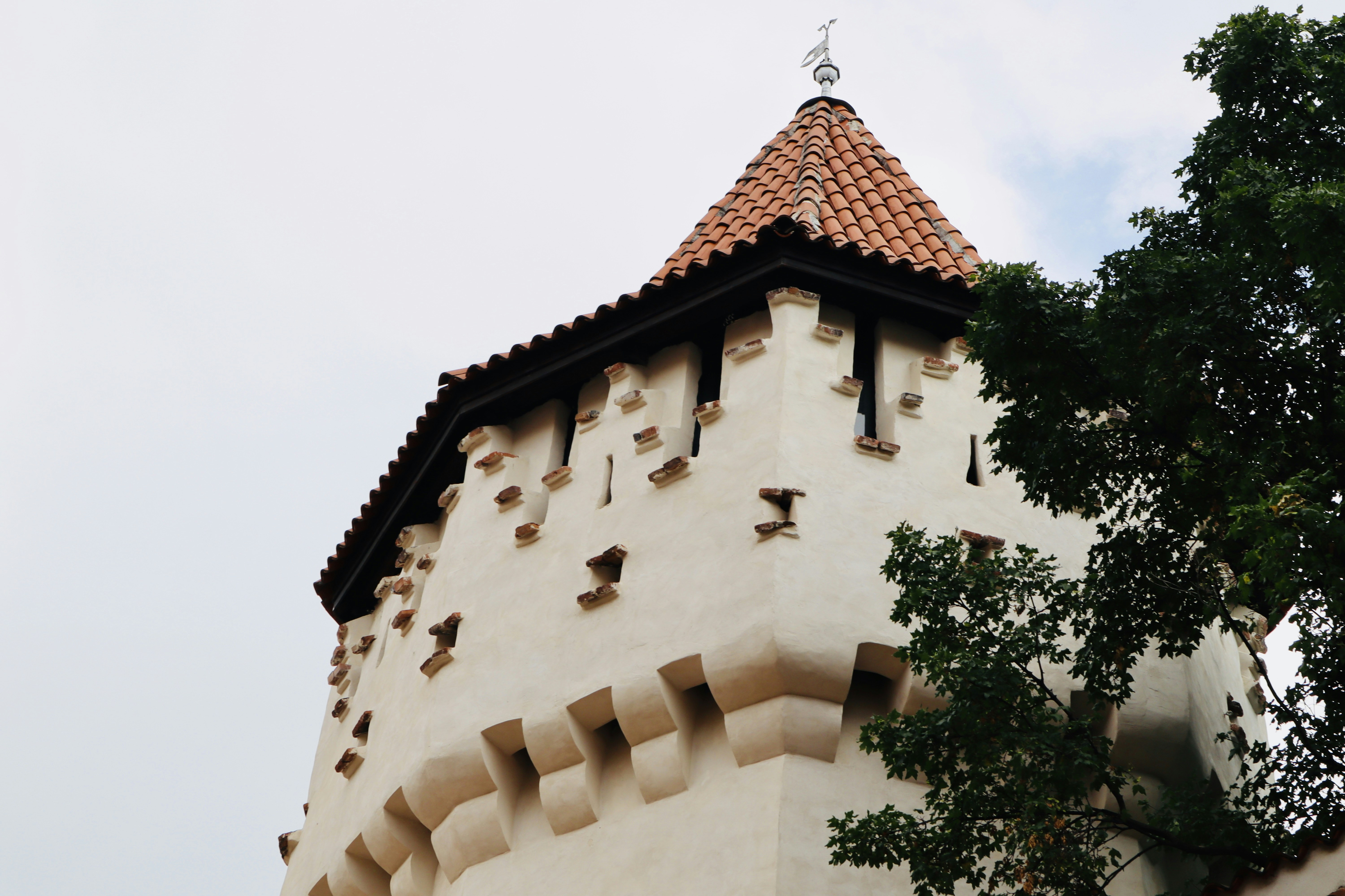 A tall tower with a clock on it's side