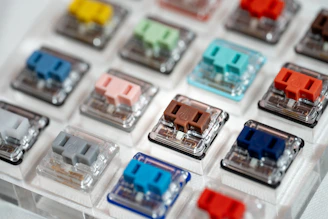 A close up of a bunch of different colored buttons