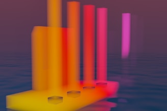 A group of colorful objects floating on top of a body of water