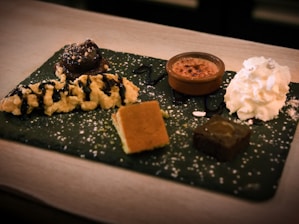 A plate topped with different types of desserts