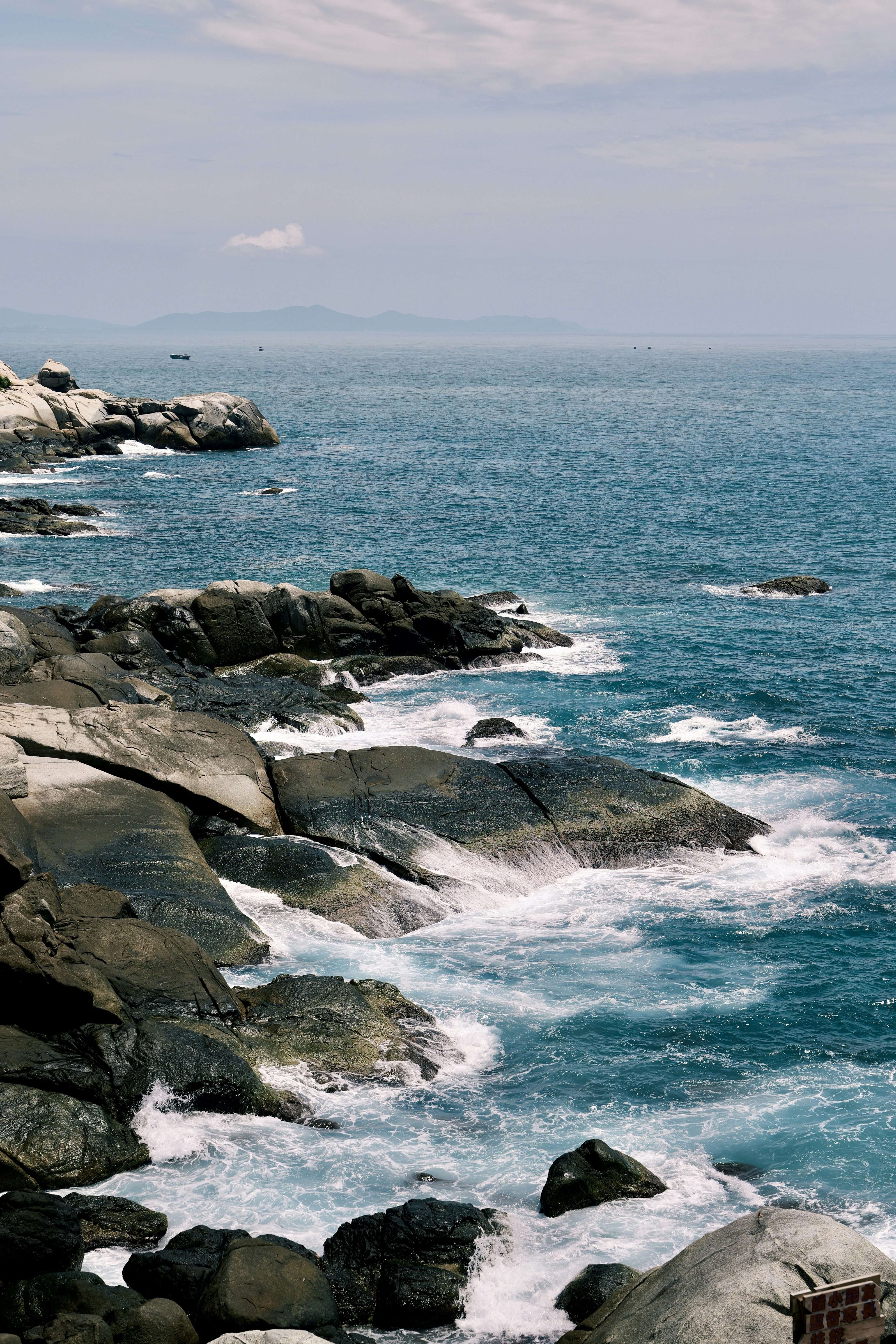 A view of the ocean from a rocky shore